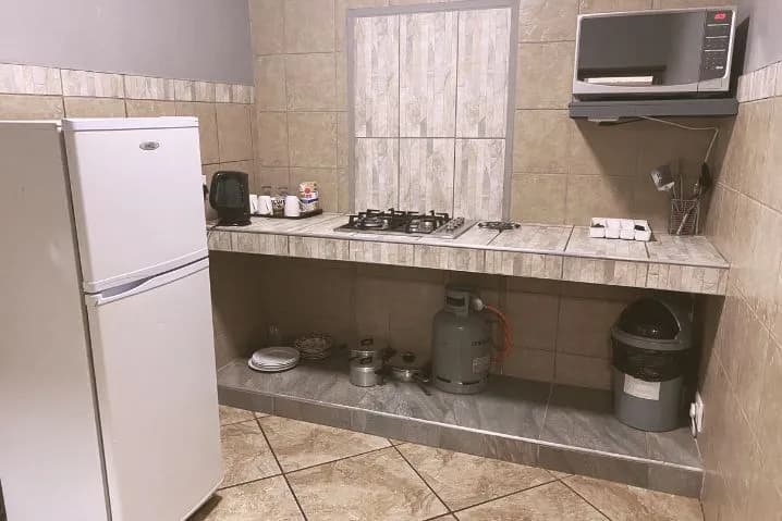 Compact kitchenette in Self-Catering Luxury Room